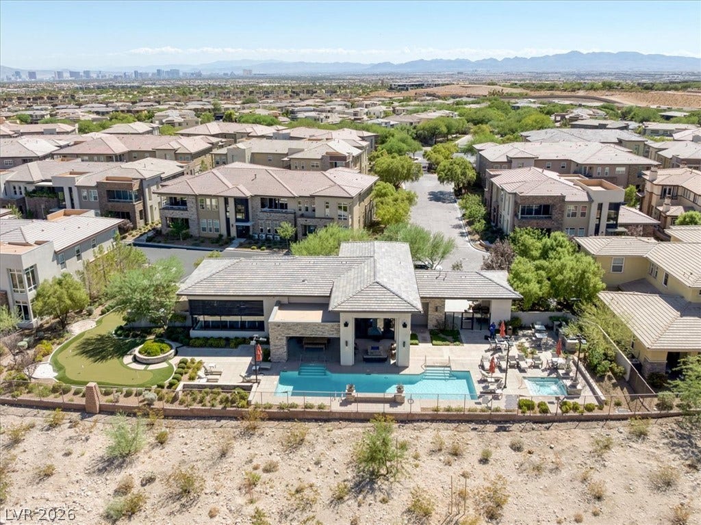 11280 Granite Ridge Drive, #1048, Las Vegas, NV 89135 Distant mountains frame this modern community pool complex, offering an elevated desert perspective.