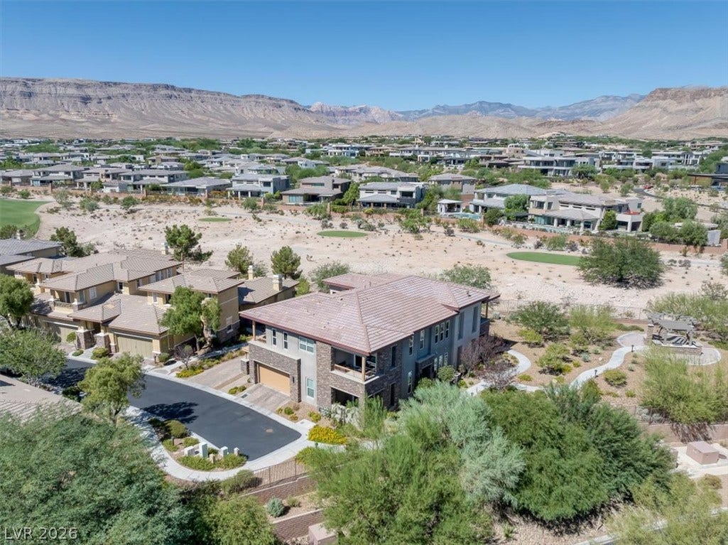 11280 Granite Ridge Drive, #1048, Las Vegas, NV 89135 Dramatic mountain backdrops frame this desert community of elegant multi-level homes.
