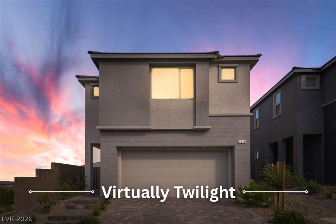 Clean lines and modern design define this two-story exterior featuring a spacious two-car garage.