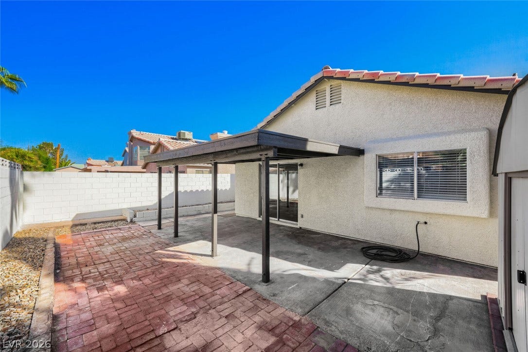 5736 Baffy Circle, Las Vegas, NV 89142 An inviting covered patio area integrates smoothly with the surrounding low-maintenance backyard.