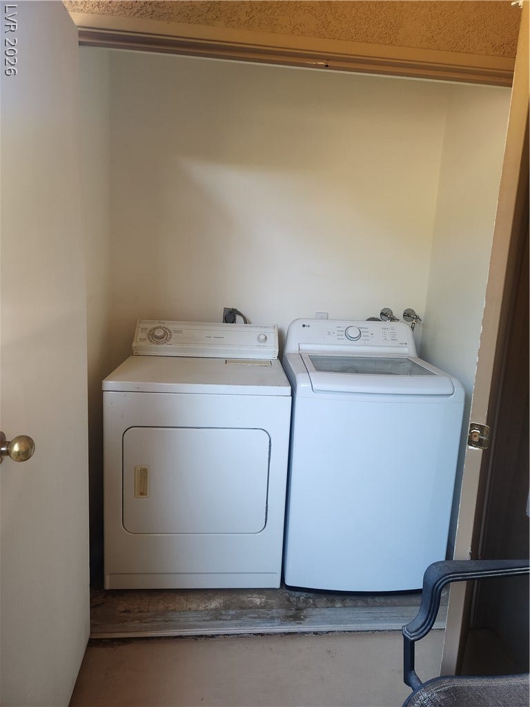 231 W Horizon Ridge Parkway, #924, Henderson, NV 89012 An alcove provides dedicated space for essential laundry appliances.