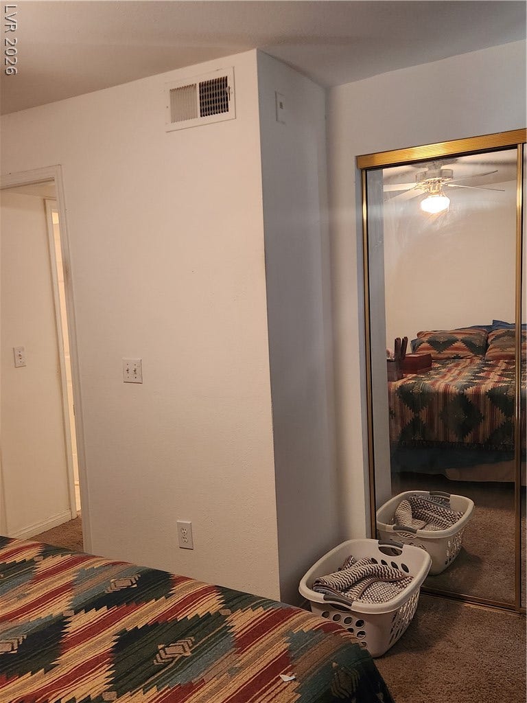 231 W Horizon Ridge Parkway, #924, Henderson, NV 89012 Mirrored sliding closet doors and soft wall-to-wall carpeting maximize light in this cozy bedroom.