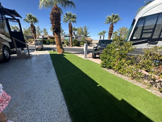 8175 Arville Street, #266, Las Vegas, NV 89139 Lush landscaping and paved parking define this premium motorhome lot.