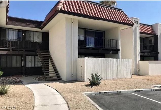 1405 Vegas Valley Drive Drive, #355, Las Vegas, NV 89169 Spanish tile accents and a private balcony detail this classic stucco exterior.