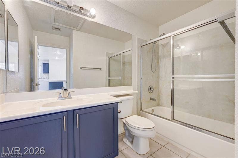 3327 Erva Street, #207, Las Vegas, NV 89117 A single vanity and tiled tub-shower combination define this functional bathroom.