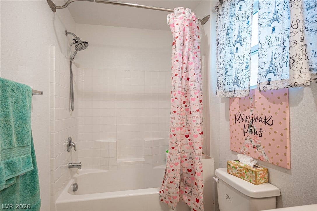 Clean lines and classic tile surround this functional tub and shower combination.
