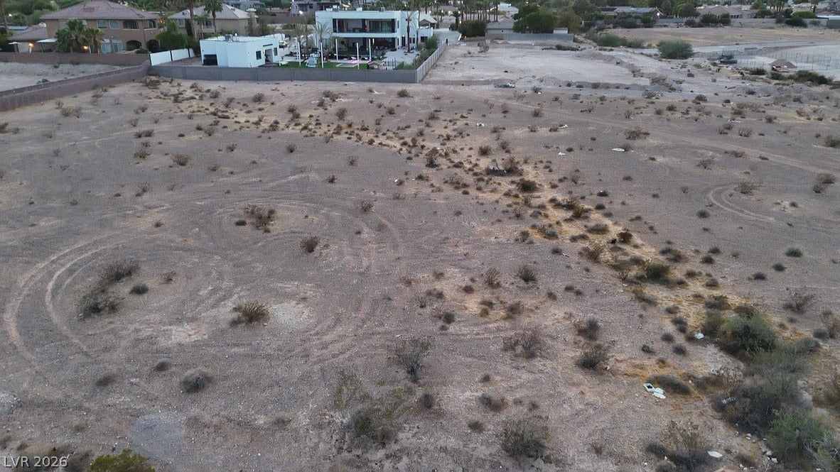 Mohawk, Las Vegas, NV 89118 A spacious desert parcel offers an ideal canvas for custom development.