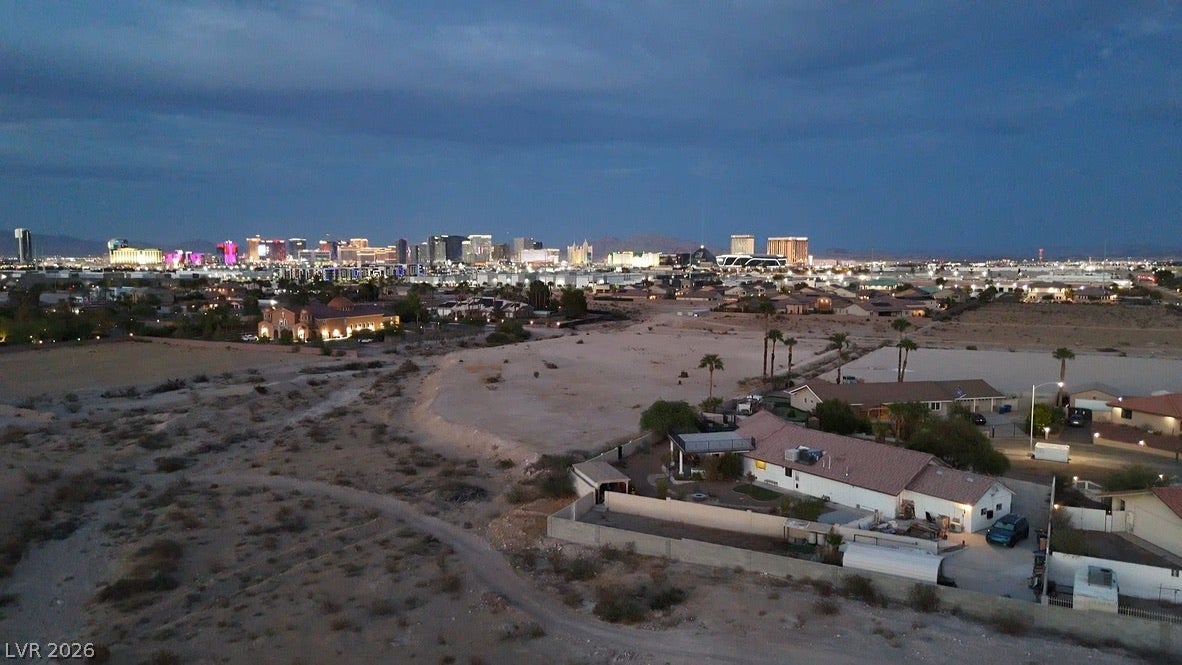 Mohawk, Las Vegas, NV 89118 Glittering city skyline views rise above the surrounding desert landscape.