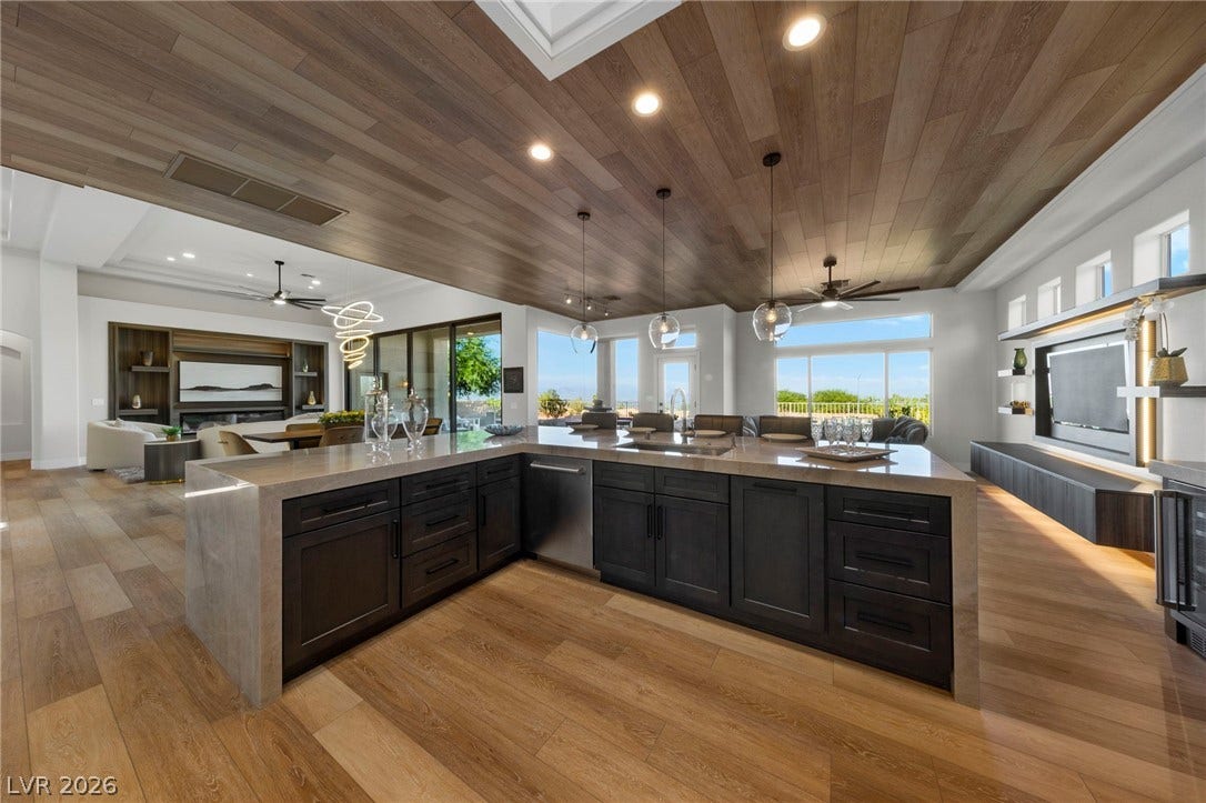 Gourmet Kitchen with Site Lines Throughout the Home....Site Lines Across the Las Vegas Valley with a Post Card View of Downtown....