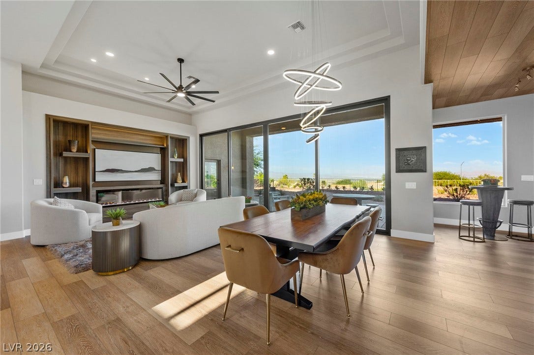 A Shot of the Great Room, Dining Area Featuring a Custom Built Window Wall for Valley Wide Viewing....