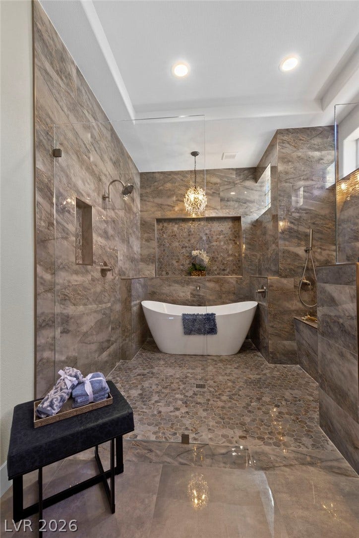 Straight On View of the Luxurious Wet Shower Space....