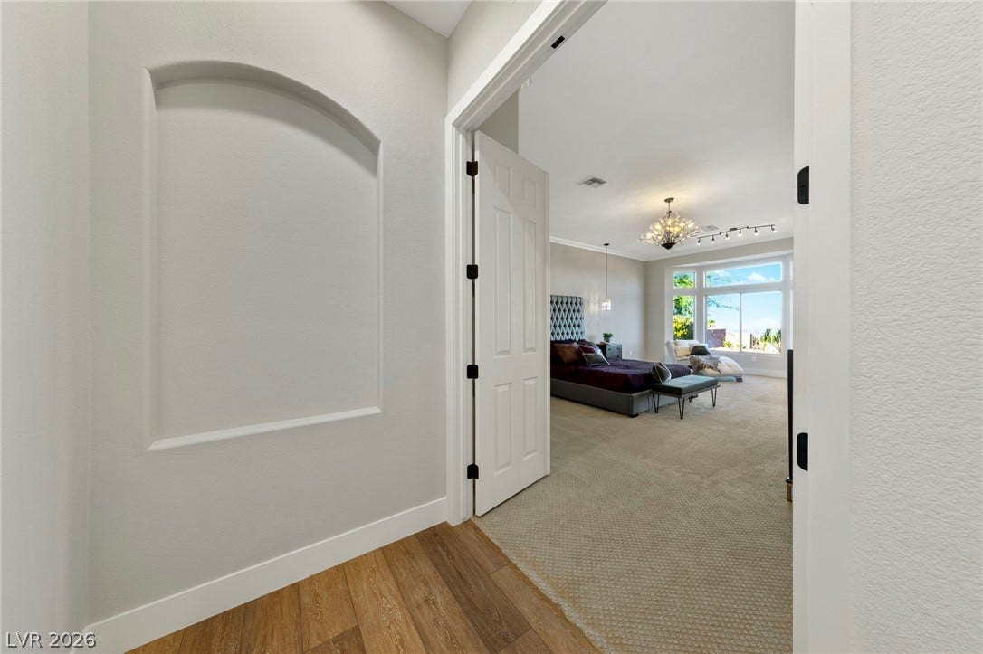 Master Bedroom Featuring a Double Eight Foot Entry Doors....