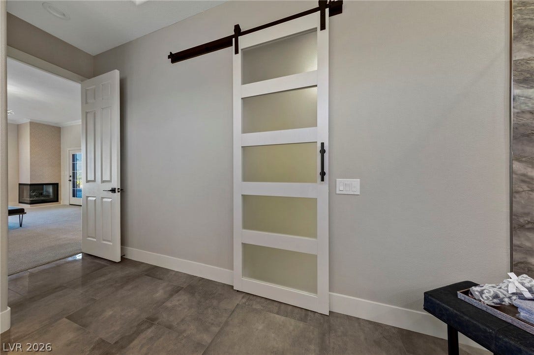 Barn Door Entry into this Oversized Master Closet....