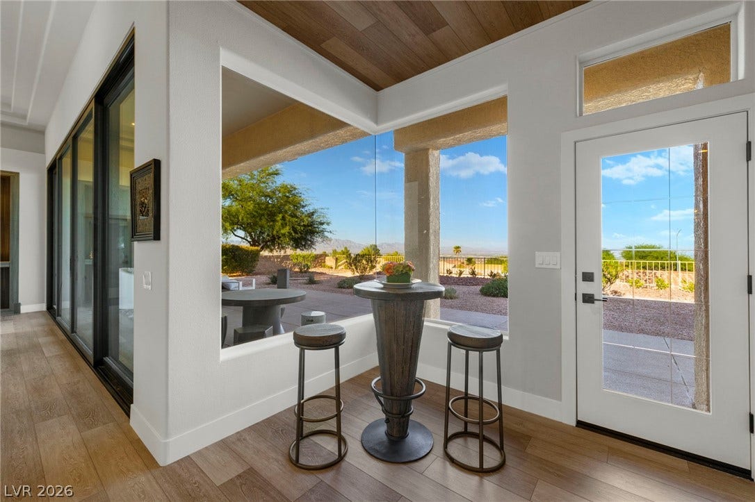 Casual Dining Area with a Custom Built Butt Glass Window allowing Site Lines for as Far as the Eye Can See...
