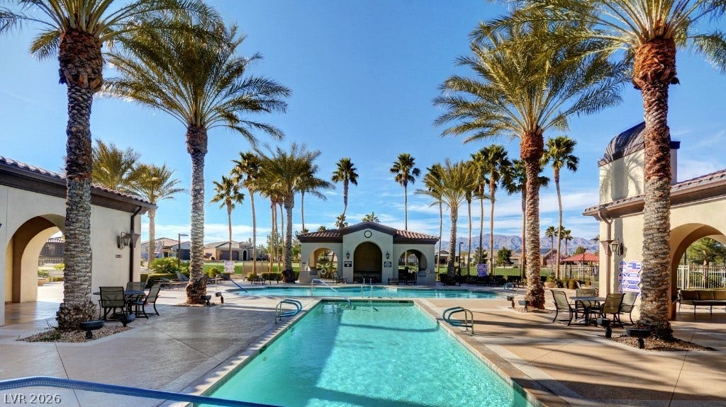 5824 Pleasant Palms Street, North Las Vegas, NV 89081 Towering palm trees frame a sparkling swimming pool in this resort-style community courtyard.