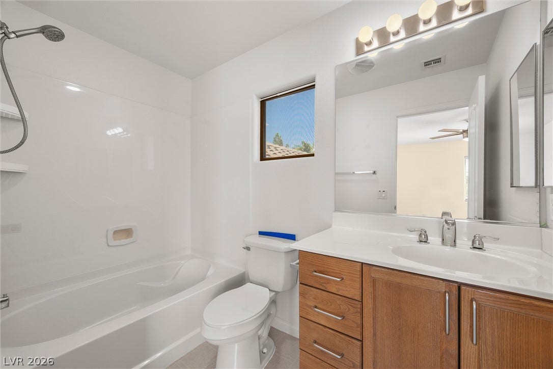 5824 Pleasant Palms Street, North Las Vegas, NV 89081 Downstairs full bathroom Clean lines and a functional layout define this bathroom complete with a soaking tub.