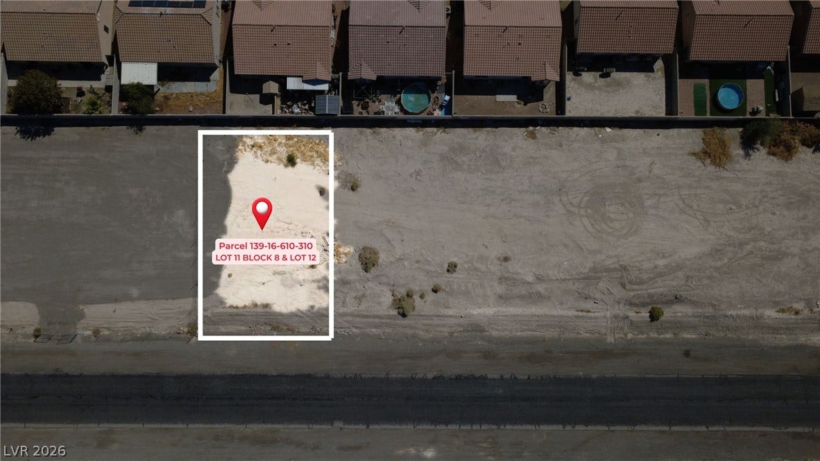 0 Reverend Wilson Drive, North Las Vegas, NV 89030 An aerial perspective showcases a prime residential building lot bordered by an established neighborhood.