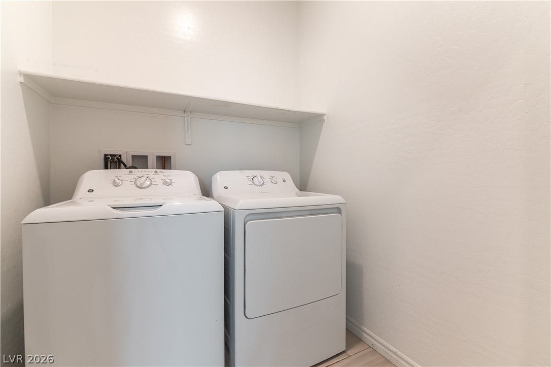 5740 Saltrock Grove Street, North Las Vegas, NV 89081 Functional utility space includes built-in shelving overhead and tile flooring.