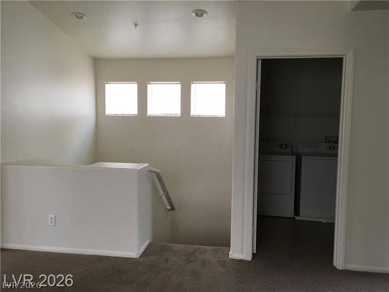 3123 Inlet Bay Avenue, North Las Vegas, NV 89031 A spacious upper landing connects carpeted stairs to an adjacent dedicated laundry area.