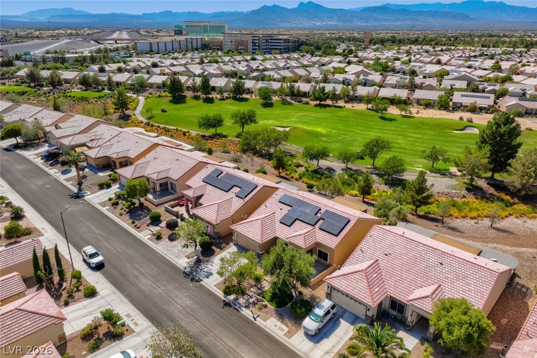 7421 Shelduck Street, North Las Vegas, NV 89084 Lush fairways and majestic mountain silhouettes create a picturesque backdrop for this peaceful neighborhood.