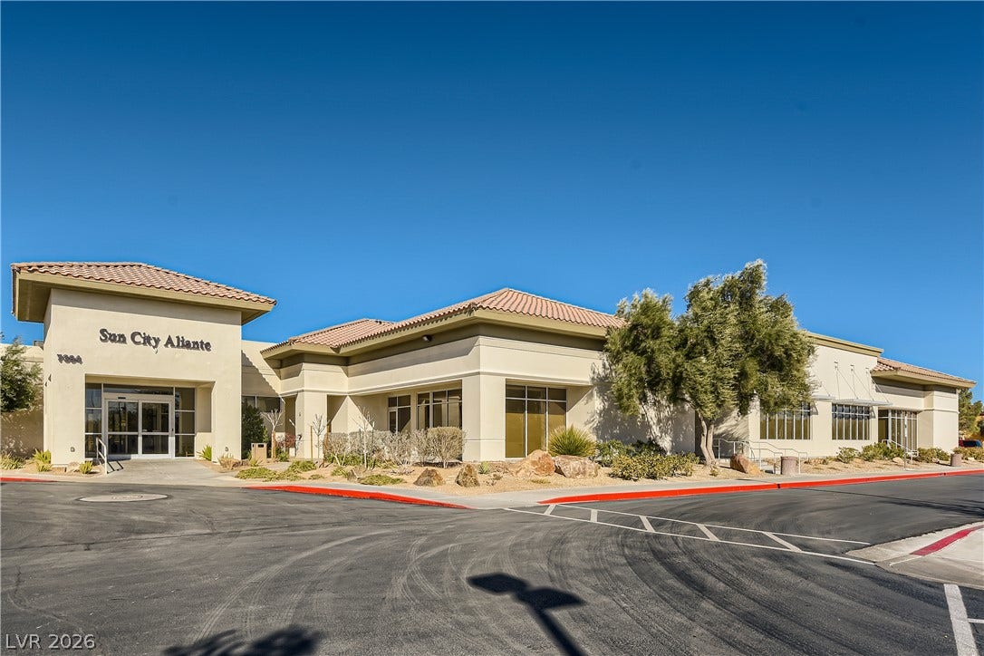 7421 Shelduck Street, North Las Vegas, NV 89084 Clay tile roofs and warm stucco finish define this desert-inspired community clubhouse facade.