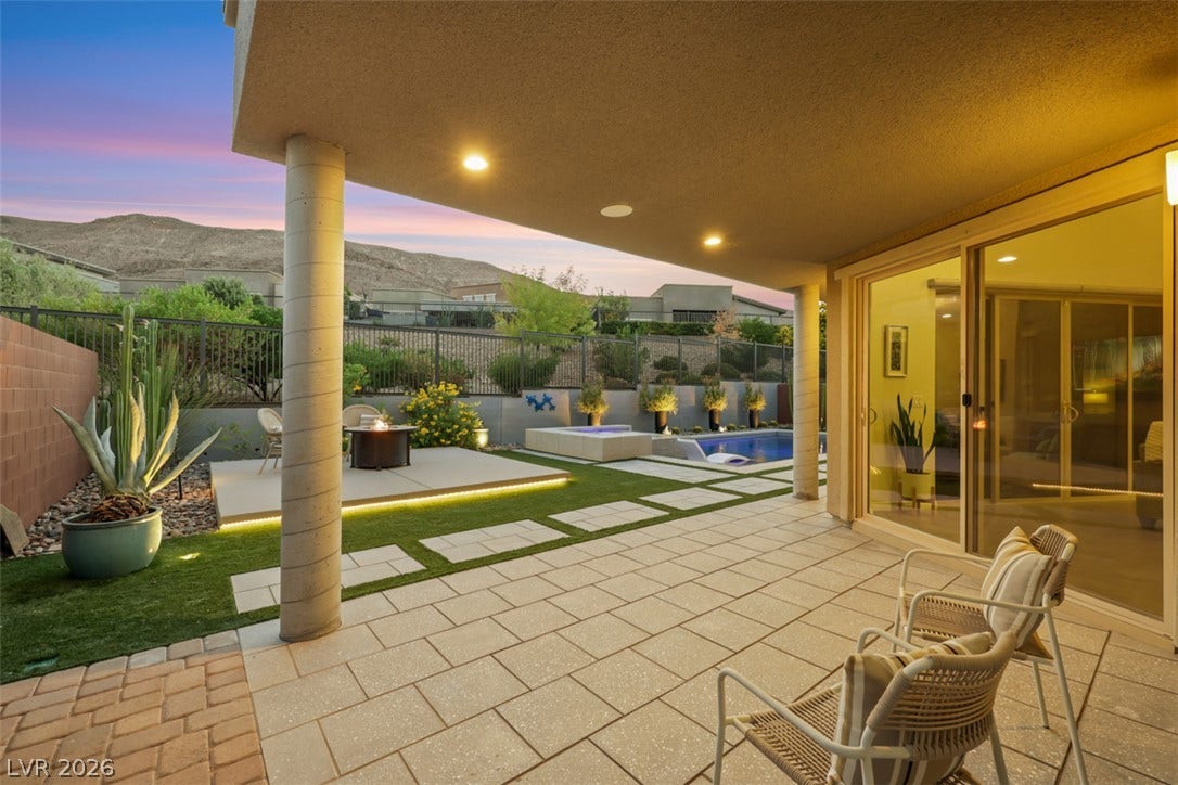 Step out to your inviting outdoor space for entertaining under colorful twilight sky.