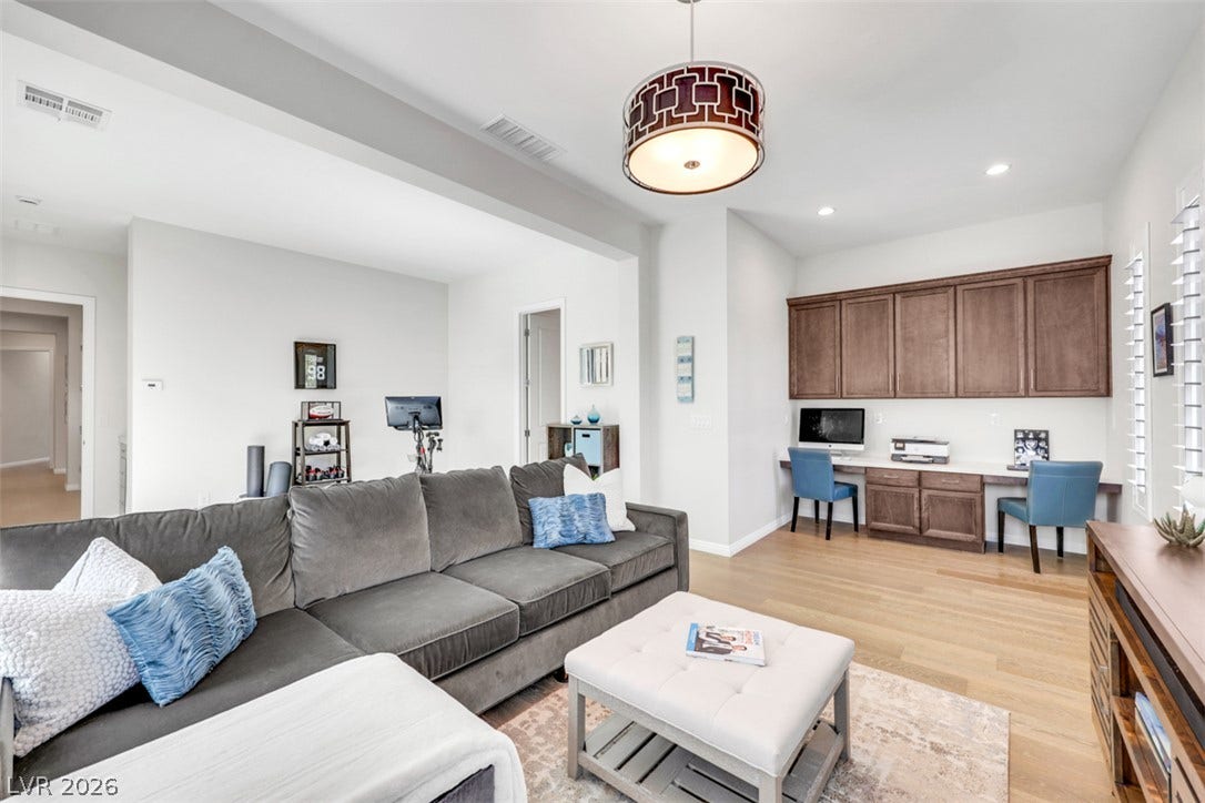 Expansive space designed for exceptional flexibility as a second primary suite, private office, fitness retreat, creative studio or luxurious personal hideaway.
