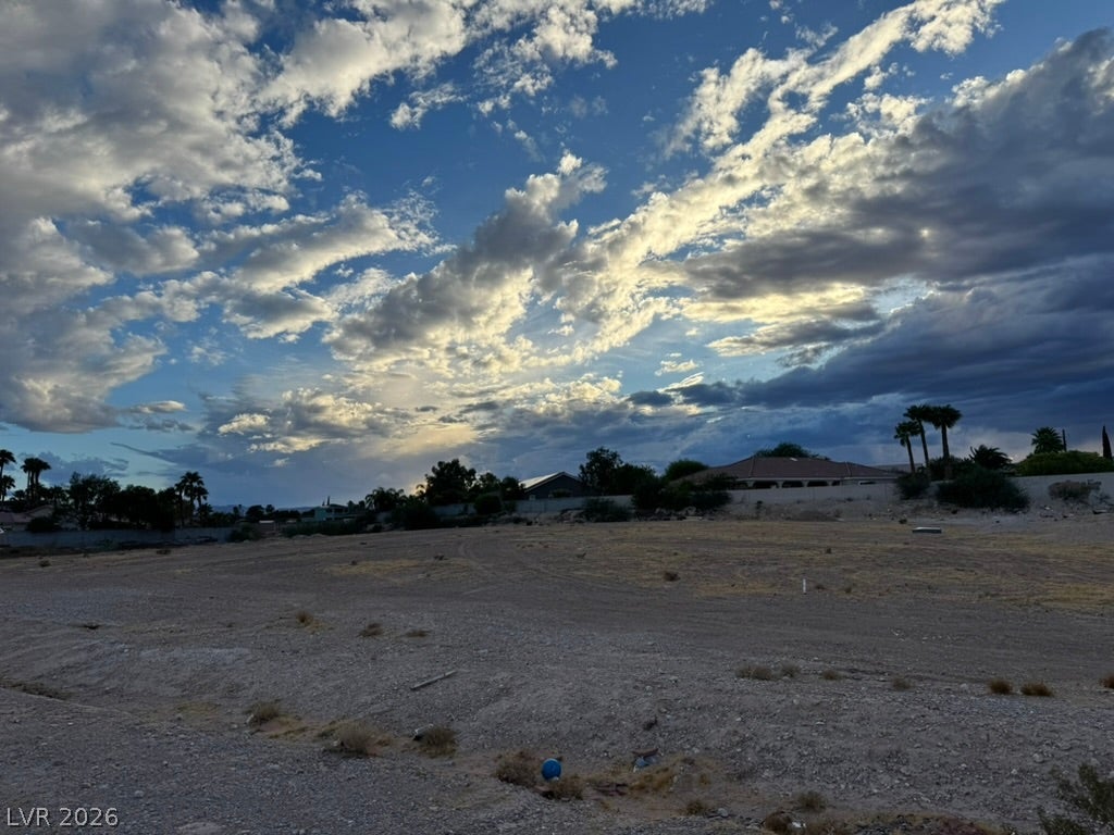 Lindell, Las Vegas, NV 89118 An open desert parcel sits ready for development under a vast mountain-valley sky.