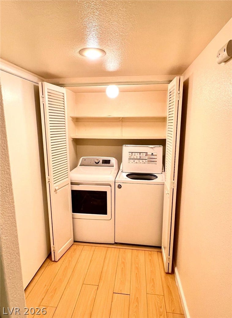 7950 W Flamingo Road, #1128, Las Vegas, NV 89147 Bi-fold doors open to reveal a functional utility closet complete with built-in shelving.