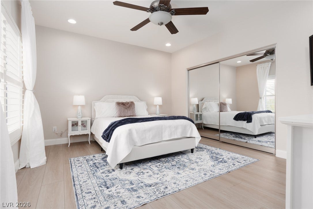 9795 Amador Ranch Avenue, Las Vegas, NV 89149 Smooth wood flooring and a wall of mirrored closets enhance this restful space.