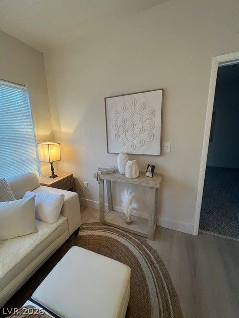 2131 Hussium Hills Street, #208, Las Vegas, NV 89108 Smooth wood floors and crisp white trim create an inviting transition between living spaces.