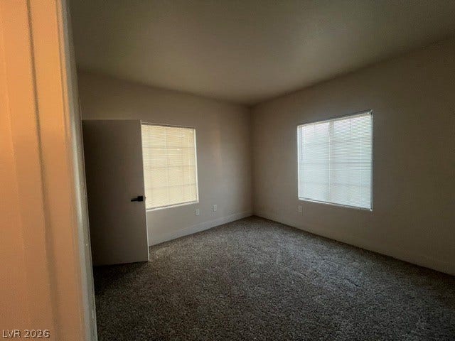 2131 Hussium Hills Street, #208, Las Vegas, NV 89108 Natural light fills this versatile bedroom complete with wall-to-wall carpeting and dual windows.