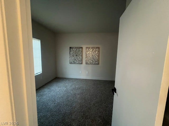 2131 Hussium Hills Street, #208, Las Vegas, NV 89108 Plush wall-to-wall carpeting and neutral tones create a quiet, comfortable bedroom retreat.