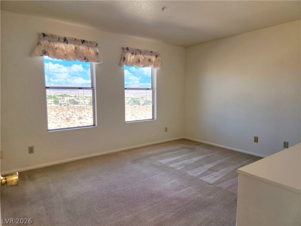 2016 Mesquite Lane, #303, Laughlin, NV 89029 Large primary bedroom with two windows providing abundant natural light,