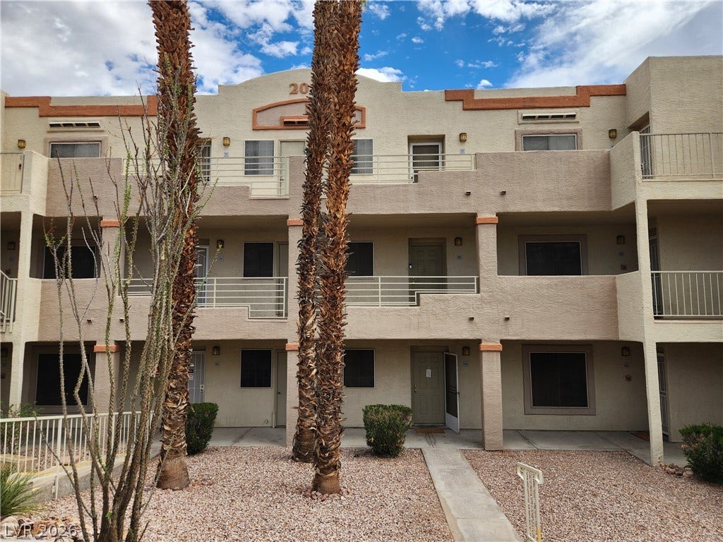 2016 Mesquite Lane, #303, Laughlin, NV 89029 Desert landscaping frames this multi-level exterior.
