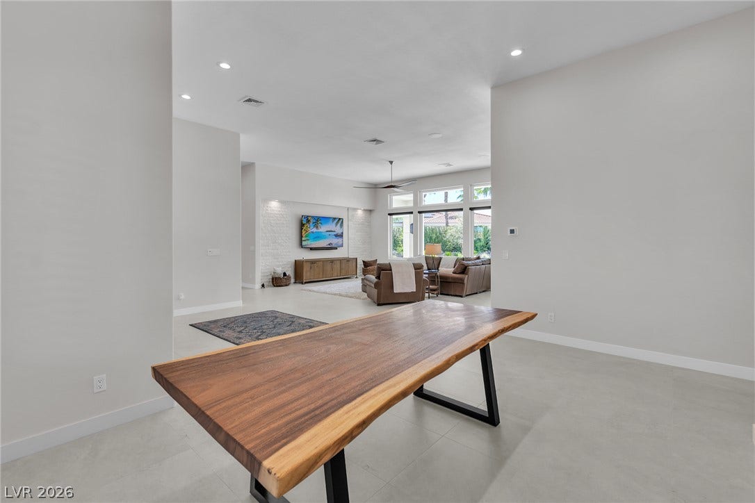1508 Ten Palms Court, Las Vegas, NV 89117 Clean lines and smooth tile flooring define this spacious, airy open-concept living area.