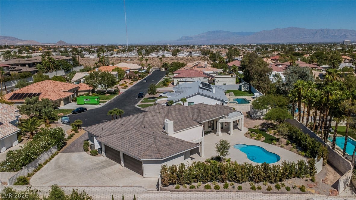 1508 Ten Palms Court, Las Vegas, NV 89117 An aerial perspective reveals a beautiful single-story residence complete with a private swimming pool.