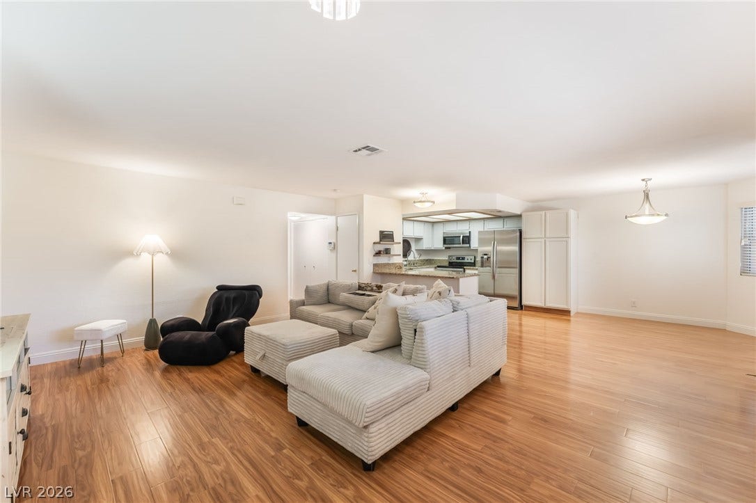 1305 Markwood Circle, #102, Las Vegas, NV 89128 Living area featuring light wood finished floors