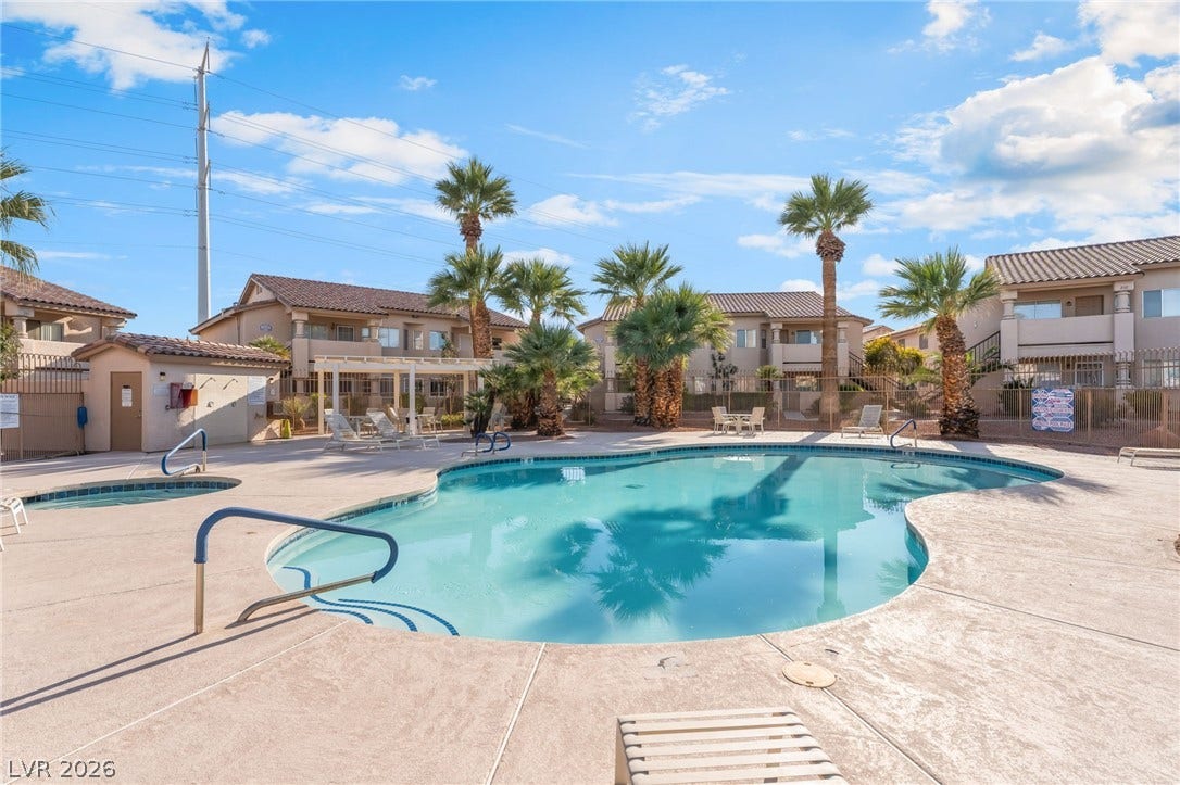 1305 Markwood Circle, #102, Las Vegas, NV 89128 Community pool with a patio and a residential view