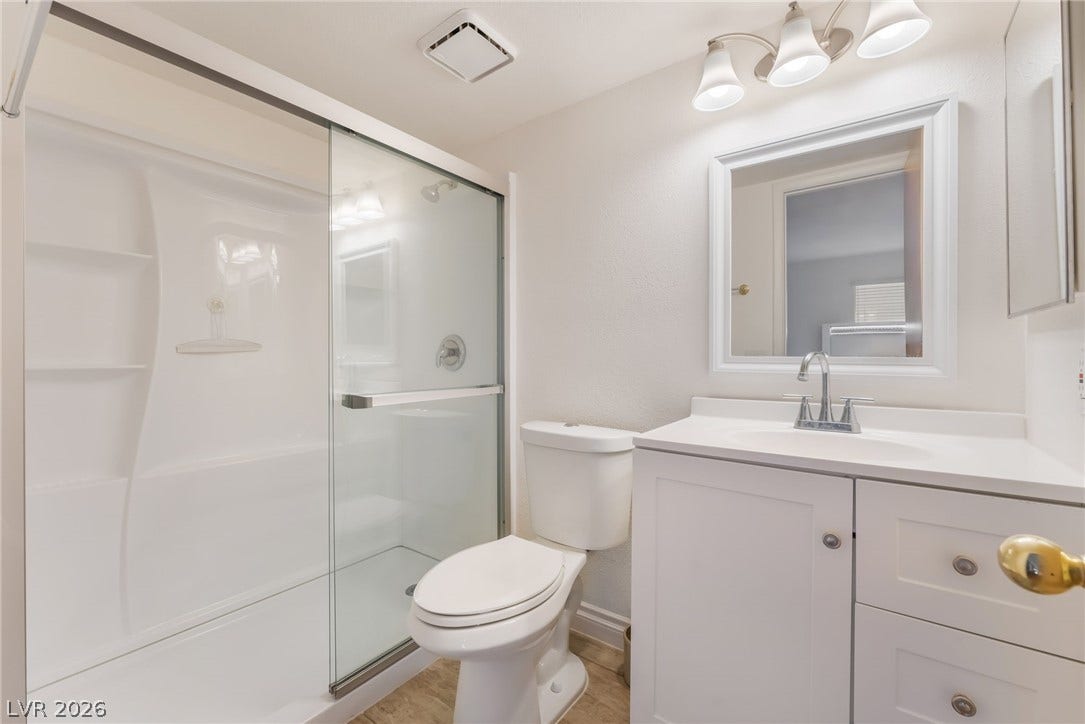 1305 Markwood Circle, #102, Las Vegas, NV 89128 Full bath featuring vanity and a shower stall