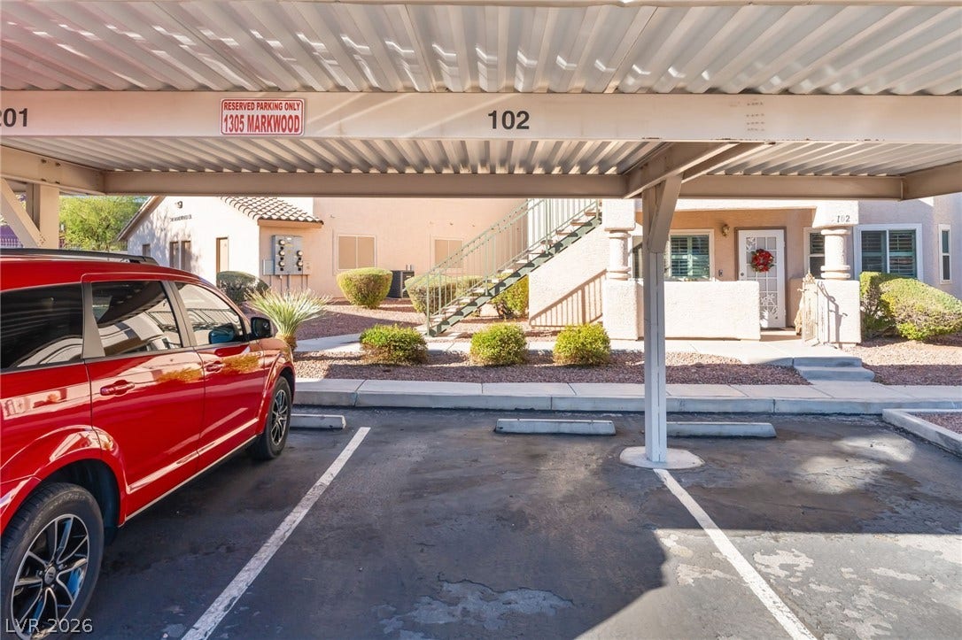 1305 Markwood Circle, #102, Las Vegas, NV 89128 Covered parking lot with stairway