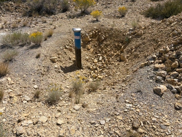 285 E Ward Mountain Drive, Ely, NV 89301 A functional well head is set within the rugged natural terrain of this parcel.