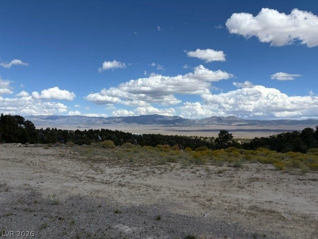 285 E Ward Mountain Drive, Ely, NV 89301 Panoramic mountain and valley vistas stretch under a vast blue sky.