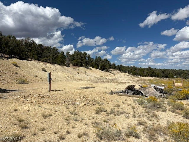 285 E Ward Mountain Drive, Ely, NV 89301 Vast natural terrain opens to sweeping mountain views under a bright blue sky.