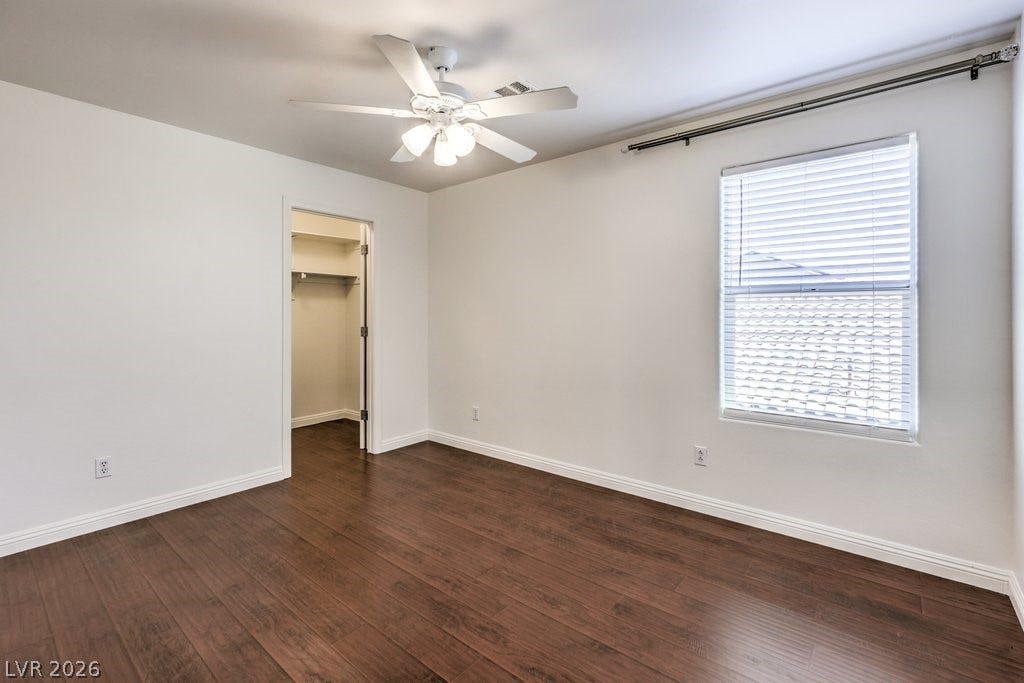 8132 Pink Desert Street, North Las Vegas, NV 89085 The 3rd bedroom offers the same luxury vinyl flooring as downstairs with the 4' baseboards. Plus, the walk-in closet. This bedroom is next to the Main Bathroom.