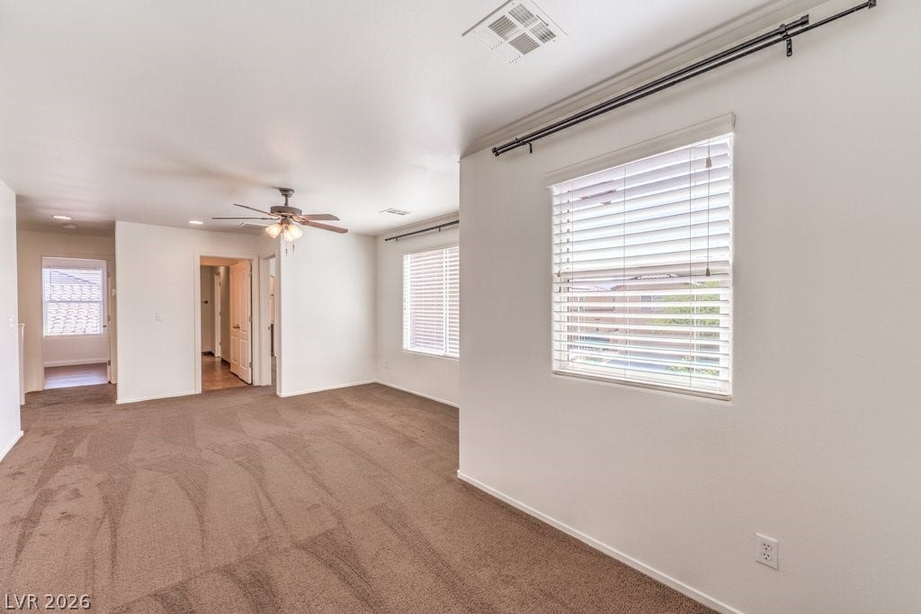 8132 Pink Desert Street, North Las Vegas, NV 89085 This space can be a workout space, the game room or even the play space.