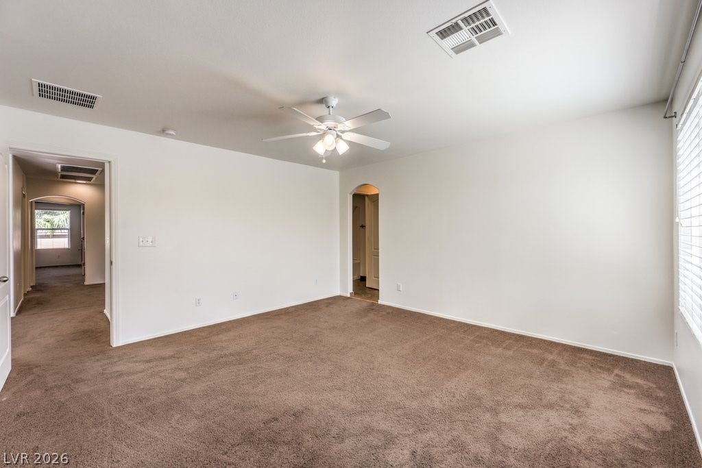 8132 Pink Desert Street, North Las Vegas, NV 89085 Upstairs bedroom offers a walk-in closet and connects to the upstairs bathroom with a private sink.