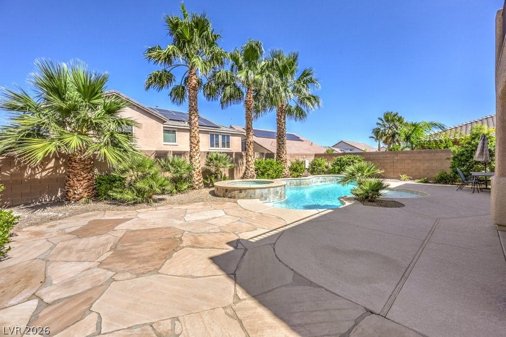 8132 Pink Desert Street, North Las Vegas, NV 89085 The inviting backyard oasis offers a sparkling pool, with solar heat and an integrated spa. There is a pool heater for the spa. Huge spacious patio areas for leisure.