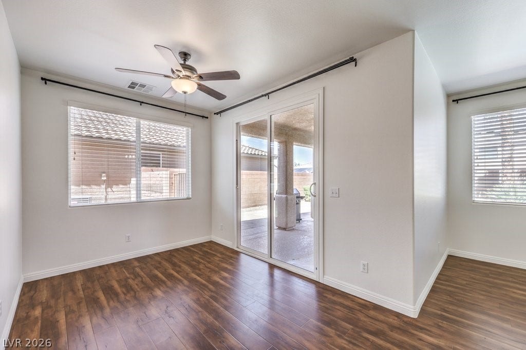 8132 Pink Desert Street, North Las Vegas, NV 89085 This is a great nook space for a casual dining room table. Convenient covered access to the covered patio and pool.
