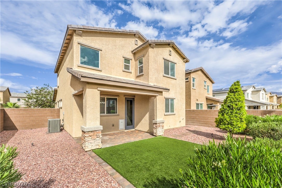 6934 Denio Island Street, North Las Vegas, NV 89084 An inviting covered patio overlooks the low-maintenance backyard enclosed by block wall fencing.